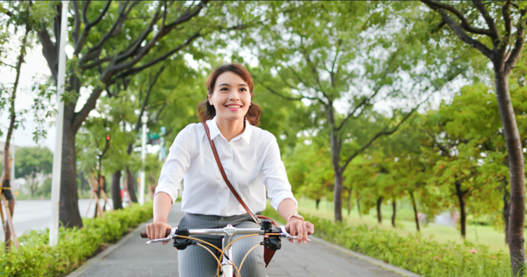 Office worker cycling, healthy city, commute, wellbeing, health